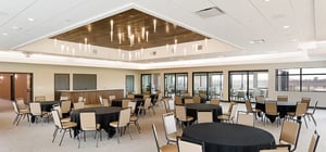 Modern country club event space with feature ceiling