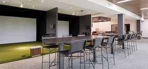 Modern country club golf simulation lounge