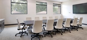 Modern conference room in a country club with head table and chairs