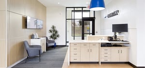 Modern communications building interior lobby with waiting area