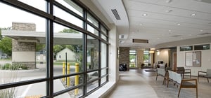 Modern healthcare clinic interior reception lobby area windows