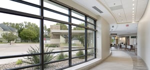 Modern healthcare clinic interior reception lobby area windows