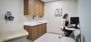 Midwife healthcare exam room with nurse