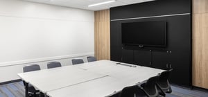 Blank Honors Center conference room with large tv wall