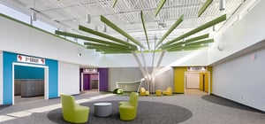 Modern elementary school community hall with a nature theme